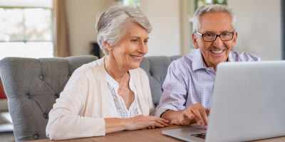 Senior couple planning ahead with elder law attorney to protect home and assets