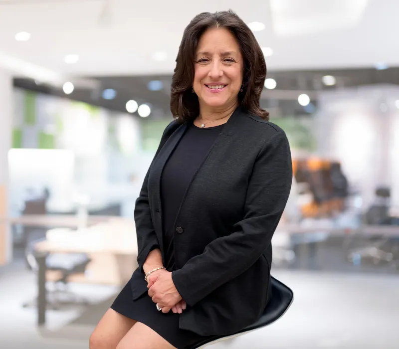 WP Elder Law Attorney Amy Dow smiling confidently in a modern office, representing over 25 years of experience helping Florida families (800 x 700px) Elder Law Attorney Amy Dow smiling confidently in a modern office, representing over 25 years of experience helping Florida families