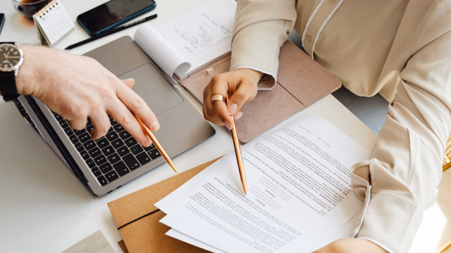 Maine family reviewing Florida trust and estate planning documents during a legal consultation for an older parent living in Florida